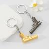 Pendente de carro de mini pistola de metal criativo modelo de simulação chaveiro de pistola para enviar aos amigos enfeites de presente comemorativo