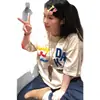 Camiseta de Manga Corta de Terciopelo con Bordado de Letras Estilo Americano High Street para Hombres y Mujeres, Nuevo Top Versátil de Corte Holgado para Parejas, Verano 2026