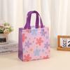 Bolsa TNT estampada fresca de novo estilo bolsa de mão TNT flor criativa bolsa de presente TNT