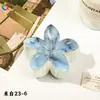 Nuevo Clip de Huevo con Flores Qiyue Moda Impresión UV Pasador de Orquídea Florale Clip de Tiburón Creativo Europeo y Americano