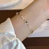Pulseira de Pérolas de Água Doce Naturais com Diamantes e Esmeraldas Redondas Pérola Shijia para Mulheres Exquisite de Alto Padrão Versátil Cordão Elástico