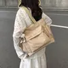 Bolso de lona de moda para mujer 2026 nuevo modelo de gran capacidad, bolso tote simple para estudiantes universitarios, bolso de mano para ir a clase, bolso de hombro