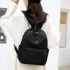 Mochila Versátil de Tela de Nylon para Viajes de Moda al Aire Libre Transfronteriza Ligera Nuevo Estilo Gran Capacidad Mochila Pequeña de Moda Bolso de Doble Hombro