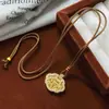 Tienda de Joyería Bañada en Oro Estilo Filigrana de Hoja de Bambú Hueca Colgante de Candado Ruyi para Mujer, Cadena de Suéter de Gama Alta de Nicho
