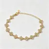 Pulseras de flor de acero de titanio con incrustaciones de diamantes, las más vendidas en Europa y América, accesorios de lujo ligero de nicho, cadenas para la clavícula, pulseras de trébol de cuatro hojas, venta al por mayor desde el fabricante
