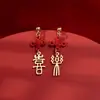 Pendientes Pequeños de Calabaza Roja de Año Nuevo, Pendientes del Año del Zodiaco Caballo, 2026 Otoño e Invierno Caliente Venta de Clips para Orejas de Año Nuevo al por Mayor