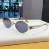 Gafas de sol GM del mismo estilo de Wang Hedi para hombre, forma ovalada de color té vintage, gafas de sol metálicas estilo old money para mujer, protección solar de alta gama