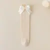 Meias Cano Médio para Meninas 2026 Transfronteiriças, Meias Infantis, Algodão Liso, Alta Elasticidade, Meias de Cano Médio Estilo Coreano para Meninas Primavera e Outono com Laço