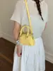 Bolsa de almohada de moda retro transfronteriza 2026, bolso versátil para ir al trabajo para mujer, bolso pequeño dulce de un solo hombro cruzado