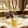 Llavero de cordero de dibujos animados lindo de oro puro 999, colgante de bolsa de oro, regalo para atraer la fortuna del año zodiacal