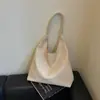 Bolsa de grande capacidade 2026 verão nova moda bolsa de ombro simples padrão trançado casual para trabalho e trajeto bolsa tote