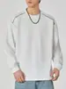 Camiseta negra de manga larga estilo americano de Anyang para hombre, nueva colección otoño 2026, con costuras de color contrastante y cuello redondo, camiseta de moda