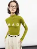 Elegante y suave camiseta básica de cuello semi-alto para mujer, nuevo estilo otoño e invierno 2026, suéter ajustado, capa interior, top de punto de hombro regular