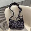 Celebridade da Internet Novo Laço de Leopardo Elegante Outono e Inverno 2024 Design de Nicho Versátil Ins Estilo Coreano Bolsa Casual Feminina