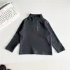 Valle del Viento 2026 Invierno Nuevo Estilo Coreano Sencillo Camiseta Básica de Cuello Alto Medio para Niños Capa Interior Gruesa Versátil para Niños y Niñas