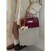 Bolso de mujer de alta calidad 2026 nueva moda bolso cruzado versátil bolso de mano exquisito súper popular bolso Kelly bolso cuadrado pequeño