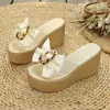 Nuevas sandalias de cuña de verano multicolor con lazo transfronterizo para mujer de talla grande, zapatillas elegantes de punta redonda con suela gruesa
