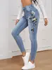 Jeans europeos y americanos personalizados para mujer, marca de moda urbana de tendencia, patrón floral bordado, color liso, corte ajustado, pantalones elásticos para mujer