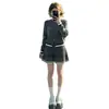Conjunto de outfit súper popular para mujer para otoño e invierno, nuevo look universitario estilo coreano, conjunto de dos piezas de suéter de punto gris y falda