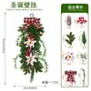 Colgante de pared de planta artificial navideña transfronterizo con lazos, ramas de pino y bayas para decoración festiva de entrada del hogar