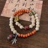Pulsera de cerámica de aleación diseño de nicho doble anillo pulsera de cerámica nuevo estilo étnico chino pulsera elástica hecha a mano
