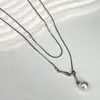 Cadena de Hueso de Serpiente de Perlas para Otoño e Invierno Moda Femenina Collar de Lujo Ligero Diseño Personalizado Cobre Chapado en Oro Nueva Cadena Versátil para Suéter Joyería