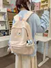 Mochila bordada com filhote de cachorro pintado em azul névoa e branco leitoso para estudantes, adequada para meninas, leve e versátil para o trajeto diário.