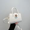 Bolsa tote estilo ocidental texturizada retrô estilo Hong Kong, inverno 2025, nova, moderna, grande capacidade, portátil, casual, bolsa transversal para deslocamento