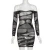 Vestido de Malha Transparente Vazado de Manga Longa Europeu e Americano para Travessia de Fronteira Boate Sexy Justo Moda Hot Girl Saia Curta que Marca o Quadril