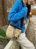 Bolso Cubo con Cordón de Patrón de Diamante para Hombres y Mujeres 2025 Nuevo Bolso de Hombro Ligero para Commuting Bolso Cruzado Versátil para Teléfono Móvil