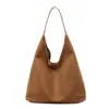 Bolsa Tote Retrô de Textura Premium para Mulheres 2025 Outono Nova Versátil e Exquisita Versátil Elegante Bolsa de Ombro Único para Axila