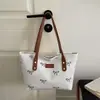 Bolso tote de lona de moda nuevo 2026 para mujer, estilo casual y dulce con un moño, gran capacidad, se puede llevar en la mano o usar como bolso de hombro