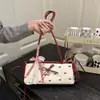 Bolsa de Ombro Seersucker Doce e Fresca 2025 Estilo de Hong Kong Casual Bolsa de Ombro com Laço Bolsa Transversal Simples e Fashion