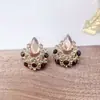 Pendientes de novia con perla ovalada y colgante de gota de agua de Amazon AliExpress.