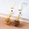 Cadena para teléfono con forma de duo de arroz con dibujos animados creativos, colgante de bola de bolsita hueca de madera, llavero de mano de sándalo, venta al por mayor