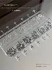 Set de Caja Transfronterizo de 12 Decoraciones para Uñas de Aleación, Decoraciones para Uñas Huecas Cruzadas Doradas y Plateadas Tridimensionales Estilo Francés al por Mayor