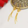 Pendientes de latón chapados en oro, venta al por mayor, nuevos pendientes de mariposa con borlas exageradas y flores de Corea del Sur para mujer.