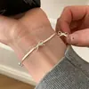 Pulsera de Nudo de Lazo Cadena Hueso de Serpiente para Mujer Dulce Personalizada Lujo Ligero Exquisita de Nicho Diseño de Alta Calidad Nuevo Llegada 2024