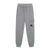 Pantalones de lente CP Europeos y Americanos COMPANY bolsillo cremallera lente pantalones deportivos casuales para hombre y mujer leggings