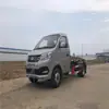 Fabricante de Caminhão de Lixo com Rodas Traseiras Duplas e Braço Gancho Quadrado Chang'An Agora Tem Muitas Unidades de Motor Dong'An de 122 Cavalos para Compra