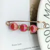Artefato apertado na cintura muda-cintura Broche oval fixo pino anti-exposição joia pino de peito pérola fivela estilo coreano estilo coreano