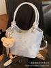 Novas bolsas femininas 2025, bolsa tipo balde popular, primavera e verão, design de nicho, bolsa transversal de ombro único, bolsa de mão de alta qualidade