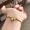 Pulseira de Cabacinha Estampa de Leopardo com Gotejamento de Óleo Maillard Minimalista Retrô Marrom, Toque de Luxo Leve de Alta Qualidade, Acessório de Mão Ajustável para Mulheres
