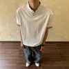 Nuevo Modelo de Comercio Exterior Camiseta de Manga Corta de Color Sólido para Hombre Verano 2026 con Parche de Espiga Camiseta Holgada Superior en Stock