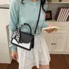 Bolsa Feminina Estilo Francês Bloqueio de Cores Único para o Dia a Dia 2026 Bolsa de Mão Elegante Simples Moda Versátil Bolsa Tote Quadrada