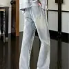 Jeans curvos estampados con patrón de rayo lavado retro americano para hombre, pantalones adelgazantes con vibra de alta costura, jeans de pierna recta acampanados