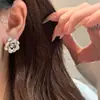Pendientes de Camelia Tridimensionales con Dibujo de Alambre Método Antiguo Sentido de Lujo Ligero Retro de Alta Gama Diseño Personalizado Moda Pendientes Elegantes Versátiles