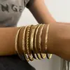 Moda Europea y Americana Nuevo Estilo Moda Personalizada Grabado Trenzado Geométrico Multicapa Apilados Pulseras Set de 10 Piezas Accesorios Al por Mayor