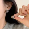 Pendientes de botón de plata S999 con perla verde aurora para mujer 2026 Nuevo estilo popular Verde pavo real Alto nivel Lujo ligero Sensación noble
