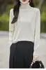Nuevo modelo primavera 2026 suéter de punto liso de algodón puro con cuello semi-alto, suéter de punto de manga larga para mujer